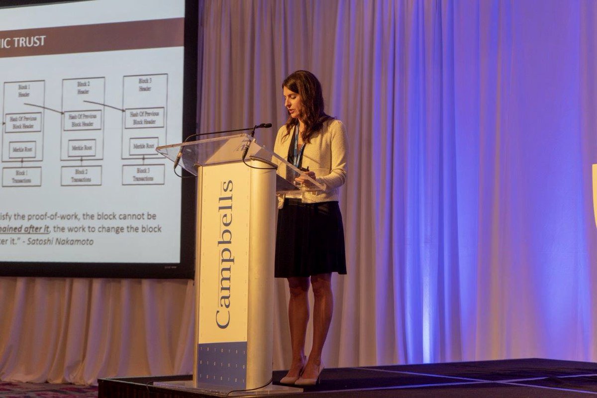 Woman presenting at Campbell's conference.